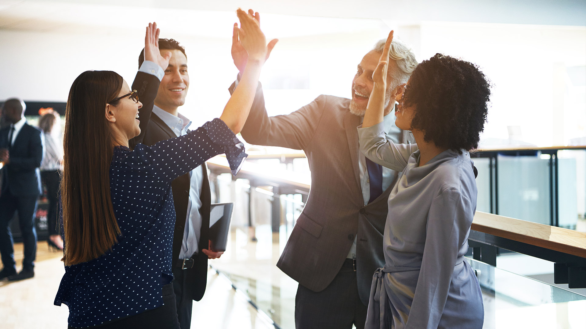 Team Members High Fiving